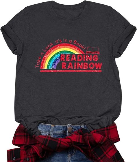 PRICES MAY VARY. Material: Reading rainbow shirt for women is made of cotton blend, the fabric feels soft and comfortable, breathable and elastic, fit. You'll love these book shirts! FEATURE: Reading teacher shirt, funny reading teacher shirts for women. book shirts, book lover shirt, reading tshirt short sleeve, world book day tee book shirts, book lover shirt, reading tshirt short sleeve, world book day tee tops,librarian shirt gift. simple and elegant cute rainbow shirt. OCCASION: These book Reading Rainbow Shirt, Reading Teacher Shirts, Reading Tshirt, Reading Month, Library Office, Teaching Outfits, Librarian Shirt, Reading Rainbow, Reading Teacher