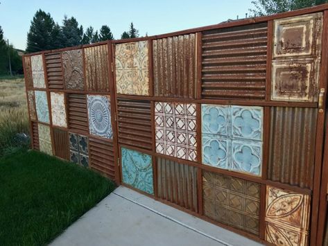 metal ceiling tile fence ~ I would make the corrugated roofing/fencing follow a zia pattern... Upcycled Fence, Cheap Privacy Fence, Antique Tin Ceiling Tile, Corrugated Metal Fence, Fence Planning, Privacy Fence Designs, Pallet Fence, Steel Fence, Diy Fence