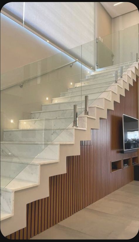 Under Stairs Storage Solutions Modern, Tv Wall Design Under Staircase, Tv Unit Below Staircase, Under Staircase Ideas Modern, Understairs Tv Unit Living Rooms, Interior Design Under Staircase, Staircase Cladding, Living Room Under Stairs, Under Staircase Ideas