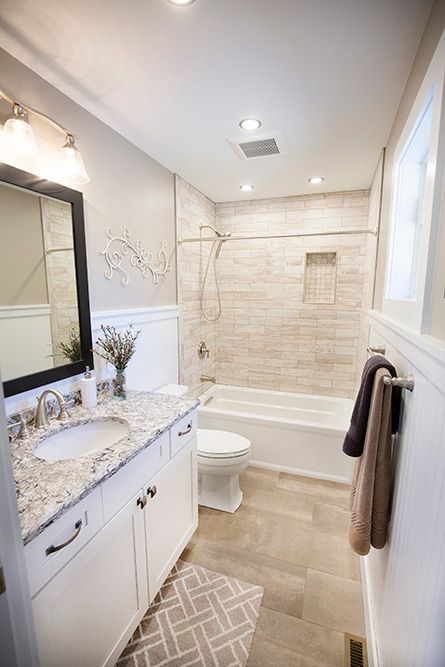 Small Bathroom Ideas Tan Tile Floor, Brown Bathroom Remodel, Bathroom Remodel Cream Color, Hall Bathroom Remodel With Tub, Greige Tile Bathroom, Neutral Bathroom Ideas Earth Tones Master Bath, Tile Half Way Up Bathroom Wall, Simple Guest Bathroom Ideas, Bathroom Tile Brown