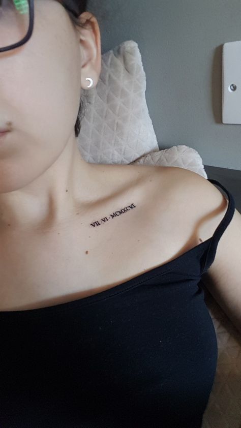 Roman Numeral On Collar Bone, Small Roman Numeral Tattoo Collar Bone, Roman Numbers Birthday Tattoo, Roman Numeral Tattoos Collar Bone, Roman Numeral Tattoo Collarbone, Date Tattoo Collar Bone, Roman Numeral Chest Tattoo Female, Collarbone Roman Numeral Tattoo, Birth Year Tattoo Collar Bone