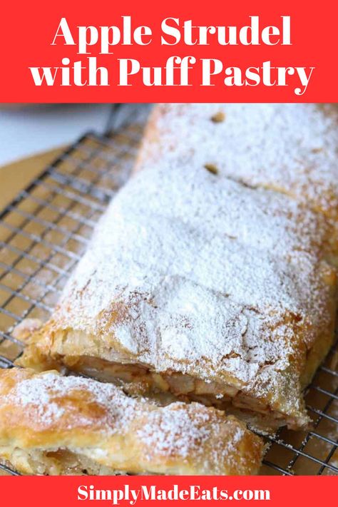 Apple strudel with powdered sugar on baking rack. Authentic German Apple Strudel Recipe, Apple Strudel With Phyllo Dough, Phyllo Apple Strudel, German Apple Strudel Puff Pastry, Apple Puff Pastry Recipes Cream Cheese, Apple Strudel With Puff Pastry, Uses For Puff Pastry, Easy Apple Desserts With Puff Pastry, Frozen Pastry Dough Recipes