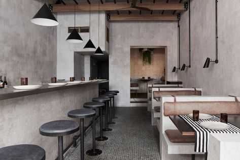 Brutalist is the new paradise? this restaurant takes clue from Sri Lankan dusk-til-dawn food culture Restaurant Paradise, Brutalist Interior, Black Stool, Concrete Interiors, Brutalist Buildings, Tile Crafts, Burger Bar, Banquette Seating, Black Tiles