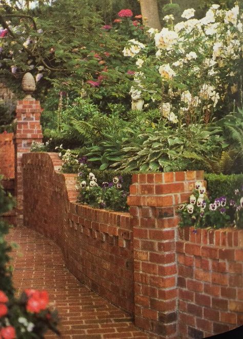 Brick retaining wall Brick Garden Fence, Brick Garden Design, Red Brick Terrace, Garden Retention Wall, Brick Wall Landscape Ideas, Brick Landscape Wall, Low Brick Wall Front Yard, Ivy Covered Fence, Small Brick Wall Garden