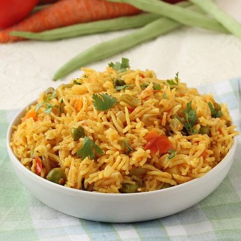 Vegetable Pulao - Spicy Rice Dish with Healthy Vegetables (carrot, green peas, tomato, beans etc.) -  Perfect for Lunchbox -Serve with plain curd or raita in lunch or dinner - Cook this pulav in a pressure cooker or a pan (see tips on recipe page) according to availability. - Step by Step Pictures Recipe Kashmiri Pulao, Vegetable Pulao Recipe, Tawa Pulao, Veg Pulao, Poha Recipe, Pav Bhaji Masala, Indian Rice Recipes, Saffron Rice, Pulao Recipe