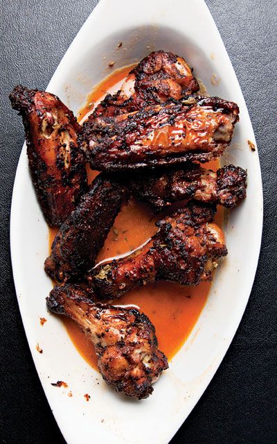 Bathed in a spiced butter sauce, crisp-charred chicken wings get a delectable kick added to the traditional smokestack recipe. Smoked Chicken Wings, Spiced Butter, Summer Cookouts, Smoked Chicken, Chicken Wing Recipes, Wing Recipes, Butter Sauce, Poultry Recipes, Nachos