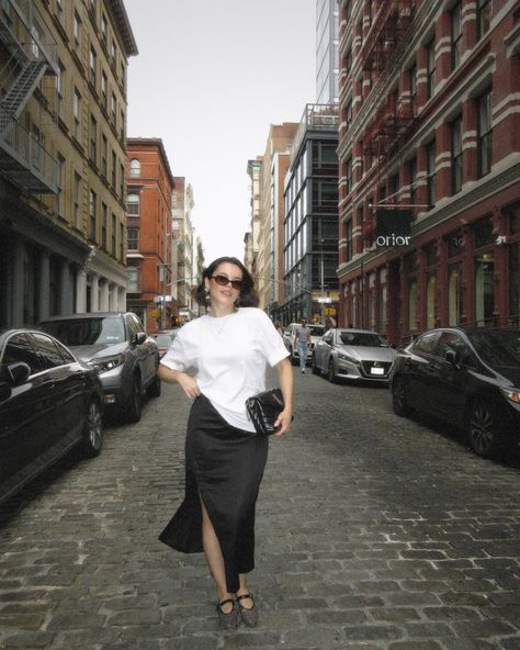 im wearing a skirt ? What is happening to me ? outfit details : tshirt @uniqlousa skirt @zara ballet flats @stevemadden glasses @madewell earrings @asos bag @ysl #summeroutfitideas #summeroutfitinspo #summeroutfits #blacksilk #timelessstyle #blackandwhite #whitetshirt #summerinthecity Oversized white tshirt, black silk skirt, ballet flats, ysl bag, elevated timeless style, silver earrings, summer in the city, oval sunglasses, chic style Skirt Ballet Flats, Madewell Earrings, Black Silk Skirt, Bag Ysl, Summer In The City, Earrings Summer, What Is Happening, Oval Sunglasses, Silk Skirt