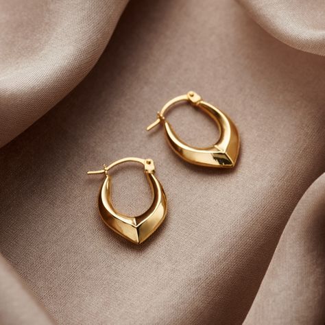 Each pair of these beautiful hoop earrings are made from pure 9ct Yellow Gold. Each hoop features an edged design coming down to a pointed drop. The edged design catches the light and makes these gold creole earrings shine. The perfect gift for yourself or that someone special in your life who deserves a little extra sparkle.Please note that earrings are non-returnable for reasons of hygiene and safety.Made from: These earrings are made from 9ct Yellow Gold. Please note that due to hygiene reaso Posh Totty, Creole Earrings, Jewelry Inspo, Online Earrings, Fine Jewellery Earrings, Summer Jewelry, Everyday Jewelry, Gold Hoop Earrings, Jewelry Care