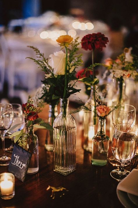 Glass Vase Wedding Centerpieces Simple, Mixed Matched Wedding Centerpieces, Mix Match Candles Wedding, Glass Vases Table Decor, Mix Match Vase Centerpieces, Mix And Match Vases Centerpiece, Vintage Vases Wedding Table, Bud Vases Wedding Centerpiece Rust, Eclectic Bud Vases Wedding