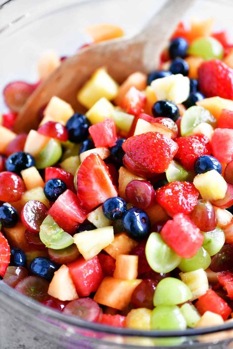 This Fruit Salad Recipe is full of colorful fruit and has a delicious lemon vanilla glaze on top. Serve it for brunch, as a side salad, or a dessert! Fresh Fruit Salad Recipe, Watermelon Pizza Recipes, Breakfast Fruit Salad, Berry Fruit Salad, Pineapple Salsa Recipe, Best Fruit Salad, Honey Lime Dressing, Fruit Dips Recipes, Fruit Salad Recipe