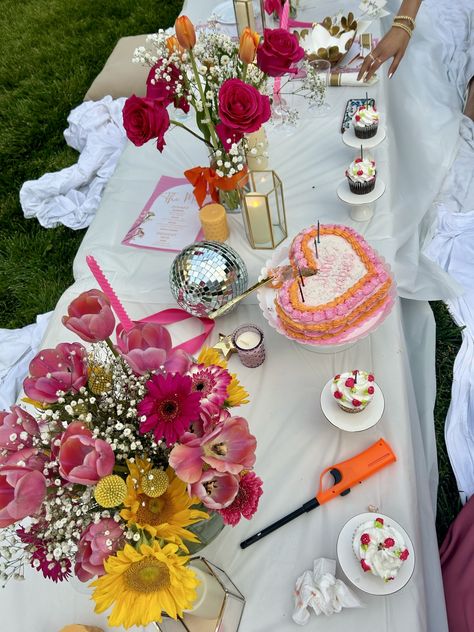 midsummer, backyard party, flowers, backyard lights, candles, birthday party, aesthetic, summer, summer bucket list, pink, orange, pink and orange, disco balls, cupcakes, cake, heart shaped cake, aesthetic cake, table layout Birthday Party Backyard, Cupcakes Summer, Garden Party Table, Orange Candles, Cute Pink Flowers, 18th Birthday Party Themes, Cake Heart, Heart Shaped Cake, Backyard Birthday Parties