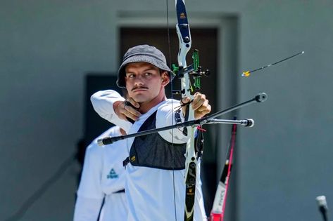 Brazil’s Marcus D’Almeida competes for a men’s team recurve archery bronze medal match against Colombia at the Pan American Games in Santiago, Chile, Saturday, Nov. 4, 2023. (AP Photo/Esteban Felix) Men Archery, Recurve Archery, Olympic Archery, Archery Competition, Kim Woo Jin, 2024 Summer Olympics, Outfit Art, 2024 Olympics, American Games