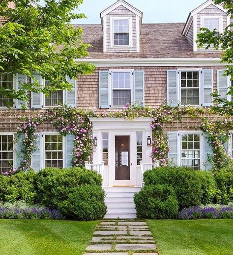 Nantucket house in bloom. Shingle House Exterior, Cedar Shake House, Colonial House Exteriors, Shingle House, Cedar Shake, Nantucket Home, Blue Shutters, Cedar Shakes, Shingle Style Homes