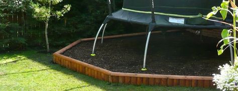 What to Put Under a Trampoline: The Best Landscaping Options » Turf Mechanic Trampoline Landscape Ideas Play Areas, Trampoline Landscaping Ideas, Trampoline Play Area, What To Put Under Trampoline, Landscaping Under Trampoline Ideas, Garden Trampoline Ideas, Trampoline On Sloped Yard, Under Trampoline Landscaping, Backyard Trampoline Landscape