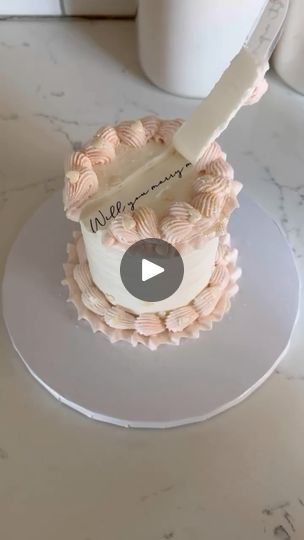 86K views · 21K reactions | 🎂💍 Surprise Proposal in the Sweetest Way! 💍🎂  This gorgeous “Will You Marry Me?” cake by @cakesbymarian_ is the perfect way to pop the question! 🍰✨ With intricate detailing and a romantic message, it’s the sweetest proposal idea we’ve seen. Who could say no to love (and cake!) like this? 😍💖  Looking for a unique way to propose? Let this stunning creation inspire your big moment!  #ProposalCake #CakesByMarian #SheSaidYes #EngagementGoals #SweetProposal #WillYouMarryMe #WeddingChicks #ProposalInspo #EngagementInspiration #CakeGoals #RomanticProposal | Wedding Chicks Will You Marry Me Cake, Proposal Cake Ideas, Will You Marry Me Ideas Proposals, Proposal Cakes Ideas, Proposal Party Ideas, Engagement Goals, Ways To Propose, Romantic Proposal, Girls Ask