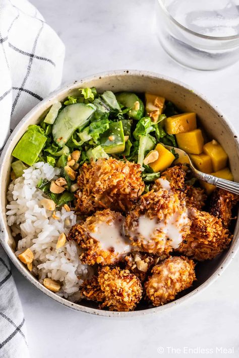 Crispy, incredible, and over-the-top delicious coconut shrimp bowls make the best dinner. If you're short on time, I have an easy kitchen hack to help you get these bowls on the table in just 20 minutes! #theendlessmeal #dinner #coconutshrimp #shrimp #coconut #shrimpbowls #dinner