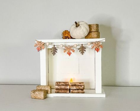 Dollar Tree Fireplace Decor, Diy Mini Fireplace, Mini Fireplace Diy, Jenga Block Fireplace, Mini Jinga Block Crafts, Dollar Tree Mini Pallet Crafts Diy, Mini Jenga Block Crafts Diy, Dollar Tree Tumbling Tower Crafts, Jenga Block Christmas Crafts