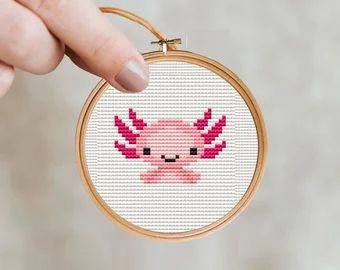 Axolotl cross stitch | Etsy Cross Stitch Kids, Axolotl Pattern, Animals Cross Stitch, Mini Animals, Tiny Cross Stitch, Small Cross Stitch, Animal Cross Stitch Patterns, Hand Stitch, Mini Cross Stitch