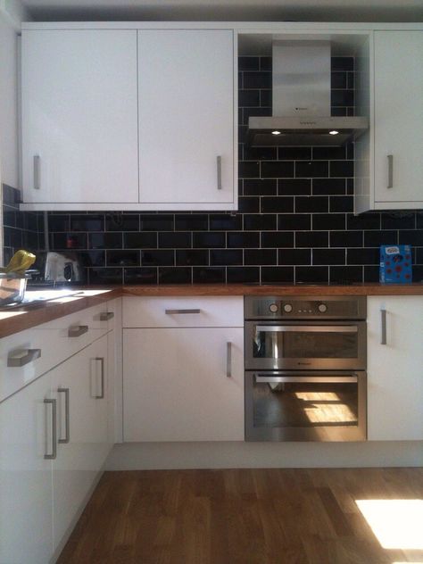 White, oak & black Wooden Benchtop, Wooden Kitchen Floor, White Kitchen Wall Tiles, Black Tiles Kitchen, White Kitchen Wall, White Brick Tiles, White Gloss Kitchen, White Cupboards, Caravan Ideas