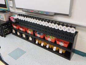 Read, Run, Teach: 2015-16 Classroom Reveal!! Under Whiteboard Storage, Student Chromebook Storage, Under Teacher Desk Storage, Class Chromebook Storage, Under Smartboard Storage, Smart Board Decorations, Whiteboard Storage Classroom, Chromebook Organization In The Classroom, Classroom Laptop Storage