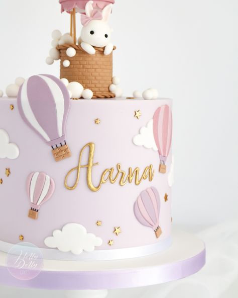 ~ Up up and Away ~ I was in love with this lilac and pink version of our popular hot air balloon cake! This has got to be my new favourite 🥰 Hot Air Balloon Second Birthday, Balloon Theme Cake, Hot Air Balloon Baby Shower Cake, 1 Year Birthday Cake, Dolly Cakes, Girls 2nd Birthday Cake, Hot Air Balloon Cake, Holly Dolly, I Was In Love