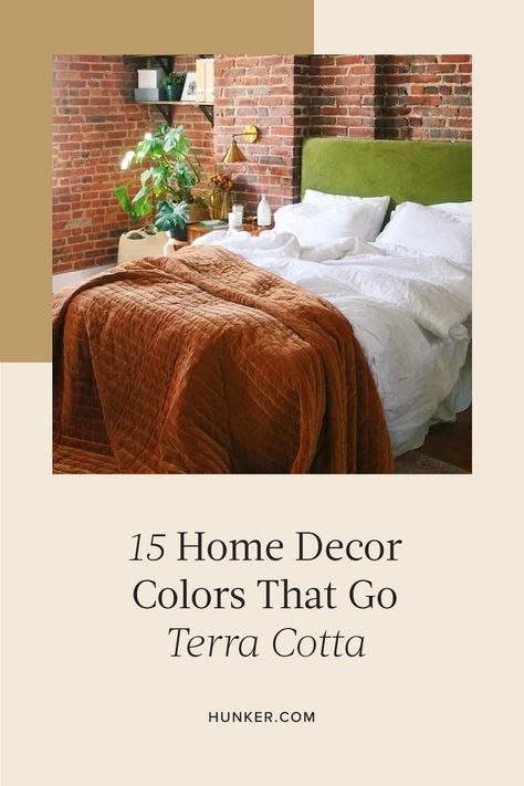 When it comes to weaving terra cotta into your home, the options are seemingly limitless, although wall paint is a popular method. Scroll on for our favorite colors to pair with the earthy hue. #hunkerhome #terracotta #terracottahomedecor #terracottahomedecorideas Olive Terracotta Bedroom, Terra Cotta Bedroom Decor, Terra Cotta Guest Room, Terra Cotta Wall Color Master Bedrooms, Terra Cotta Bedding, Teracotta And Green Bedding, Green Wall Terracotta Bedding, Terra Cotta Bedroom, Rustic Cottage Bedroom