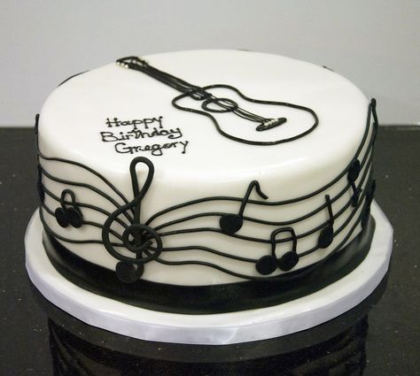 A black and white musical/guitar cake for a musician's birthday. Created by… Musician Cake, Guitar Birthday Cakes, Music Note Cake, Bolo Musical, Music Themed Cakes, Piano Cakes, Music Cakes, Music Cake, Guitar Cake