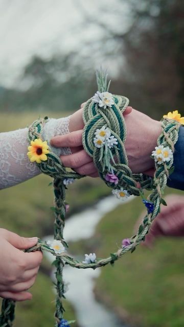 Ceotha | Handfasting Cords on Instagram: "Which cord from our NEW Spring collection are you tying the knot with?   Shop these cords via the Etsy link in our bio! Under the Spring 2024 collection.   #floralwedding #handfasting #handfastingceremony #floralsinspring #handfastingcord #forestmeadow #roses" Celtic Knot Tying Ceremony, Handfasting Ceremony Ideas, Handfasting Pictures, Tying The Knot Ceremony, Knot Tying Ceremony Wedding, Wedding Knot Tying Ceremony, Handfasting Cords Colors Meaning, Hand Tying Ceremony, Diy Handfasting Cords