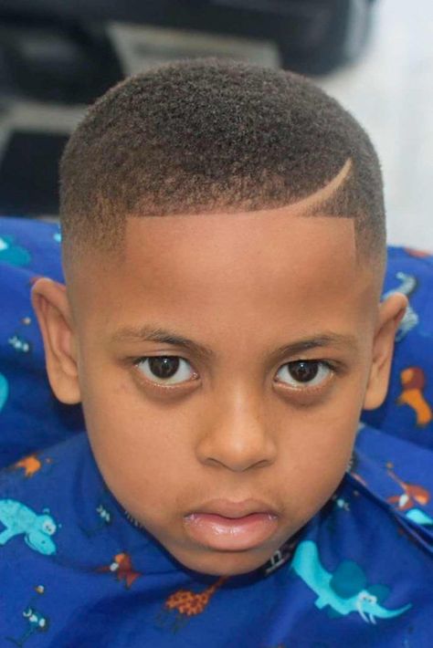 Black Boys Haircuts And Hairstyles (2021 Update) | MensHaircuts.com Black Boys Haircut Trendy, Haircut For Boys Kids Trendy, Short Boys Haircut Trendy, Black Boys Haircuts Kids, African American Boy Haircuts, Black Kids Haircuts, Haircuts For Black Boys, Lil Boy Haircuts, Boys Haircut Trendy