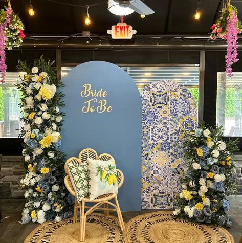 Amalfi Coast Bridal Shower If you want something like this for your party, contact us and book now 516 601-9455 #amalficoastdecor #balloonsnj #southjerseryballoons #southjerseypartyrentals #southjerseypartyplanner #softplayrentalnj #partyplannernj #philadelphiaballoons #phillyparty #phillypartyplanner #mantuaballoons #mullicahill #mullicahillnj #bridetobe #bridalshowernj Amalfi Coast Balloon Arch, Blue And White Haldi Decor, Amalfi Backdrop, Amalfi Coast Theme Party Backdrop, Amalfi Coast Party, Bridal Shower Yellow And Blue, Balloon Birthday Themes, Haldi Decor, Wedding Entrance Decor