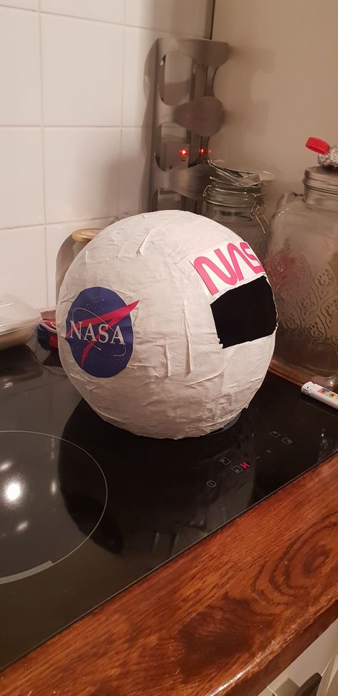 Paper Mache Space Helmet, Paper Mache Astronaut Helmet, Astronaut Helmet Diy, Helmet Diy, Space Helmet, Astronaut Helmet, Space Theme Party, Diy Space, Styrofoam Ball