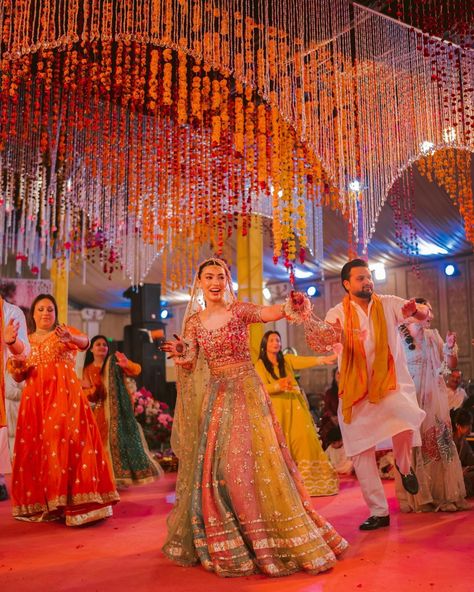 Gracing your feed with a dash of colour gleaming filled Sangeet night, stunningly captured by @sidishh_ . . . . Follow for more wedding inspiration @weddingbanquetsindia . . . Image credits - @sidishh_ @yasmiinekhn @isla.events @deenarahmanlahore @henna_by_shamsa . . . #sangeetnight #colour #bridesquad #bridetobe #pakistanwedding #pakistaniweddings #sangeet Colourful Sangeet Decor, Sangeet Aesthetic, Sangeet Photoshoot, Sangeet Entry, Indian Wedding Night, Sangeet Photography, Sangeet Dresses, Indian Wedding Sangeet, Indian Sangeet