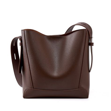 Leather Bucket Tote Bag and Handbags Shoulder Bag $50.95 USD www.smartshopper888.com use code SMARTSHOP20 and get 20% off on your first purchase. FREE SHIPPING. This Leather Bucket Tote Bag and Shoulder Bag is made from high-quality, two-layer cowhide in a variety of colors including black, salt khaki, smoky gray, golden brown, and brown. With its medium hardness and genuine leather material, this bag is durable and stylish. It features a single shoulder strap for easy carrying. Black Salt, Secret Pocket, Bucket Tote, Bucket Bags, Travel Work, Leather Bucket, Genuine Leather Bags, Types Of Bag, Womens Crossbody Bag