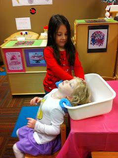 Shampoo sink for dramatic play       One of the teachers at our school was so clever coming up with this "shampoo sink".  It is a dish pan... Hair Salon Preschool Theme, Beauty Salon Theme Preschool, Hair Salon Preschool Dramatic Play, Community Helpers Dramatic Play Preschool, Beauty Salon Preschool Dramatic Play, Dramatic Play Salon, Beauty Shop Dramatic Play, Hair Salon Pretend Play, Dramatic Play Beauty Salon