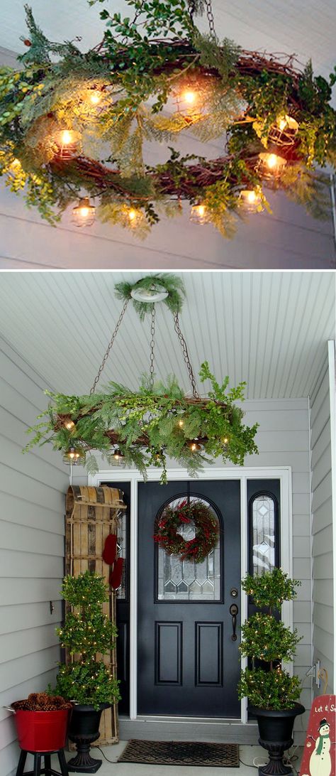 Christmas wreath hung in place of your porch light.  What a beautiful addition to your Christmas decorations! Kattokruunu Diy, Wreath Chandelier, Porch Ornaments, Christmas Front Porch, Christmas Decorations Diy Outdoor, Diy Chandelier, Hanging Wreath, Christmas Porch, The Ceiling