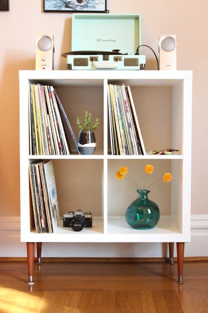 If Brad still dislikes the Bludot console, consider this. Inexpensive.  Can also mount it too the wall with the right support brackets. Would be cool to do that. Big Impact, Small Effort: Easy Upgrades for IKEA Furniture Ikea Upgrades, Ikea Hacks Ideas, Vinyl Record Shelf, Ikea Kallax Shelf, Palette Furniture, Diy Home Decor For Apartments, Record Shelf, Hacks Ikea, Ikea Hack Ideas