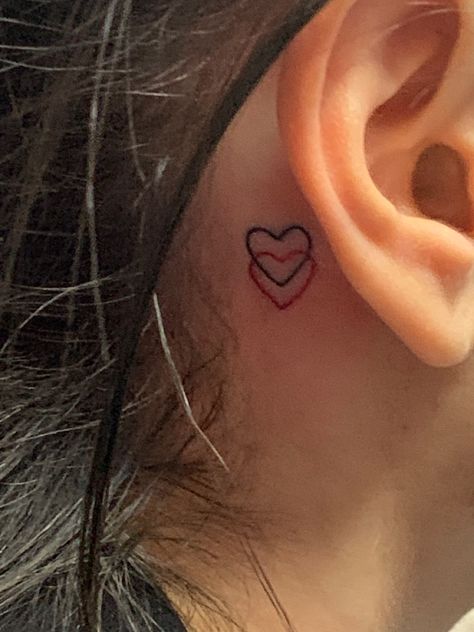 heart tattoo Behind The Ear Tiny Tattoos, Neck Tattoos Women Heart, Behind The Ear Tattoo Ideas Matching, Red Heart Ear Tattoo, Small Back Of The Ear Tattoos For Women, Small Matching Tattoos Behind Ear, Heart Tattoos Behind The Ear, Tiny Queen Of Hearts Tattoo, Heart Throat Tattoos Women