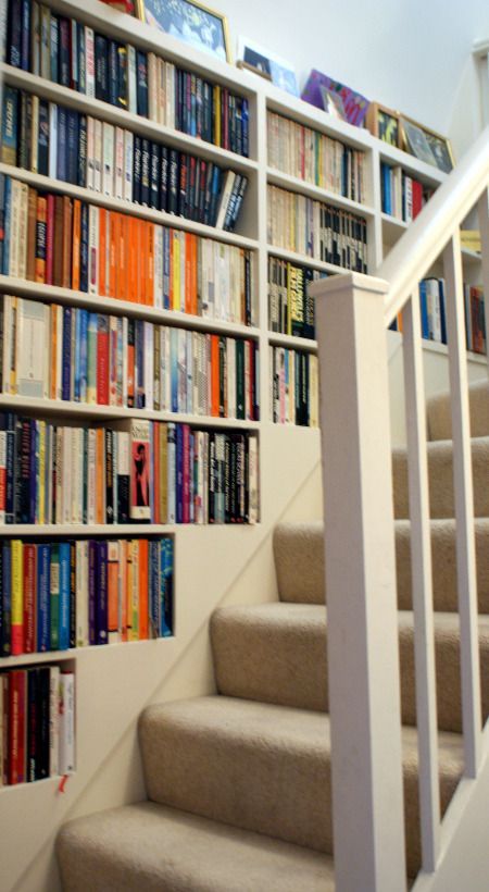 Bookshelf wall up stairway. Bookcase Stairs, Staircase Bookshelf, Stair Bookshelf, Stair Shelves, Building Stairs, Stair Wall, Wood Staircase, Stair Case, Wall Bookshelves