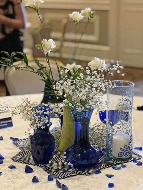 Cobalt Blue Wedding Centerpieces, Blue Bottle Centerpieces, Sapphire Anniversary Party, Navy Centerpiece Wedding, Sapphire Decorations, Corporate Event Table Decor, Blue Table Arrangements, Sapphire Blue Wedding Theme, Blue Centerpieces For Party