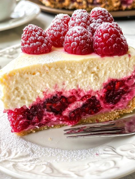 White Chocolate Raspberry Cheesecake Chocolate Bourbon Cake, Raspberry Swirl Cheesecake, White Chocolate Raspberry Cheesecake, Raspberry White Chocolate, Chocolate Raspberry Cheesecake, Peppermint Cheesecake, Swirl Cheesecake, Cake Roll Recipes, White Chocolate Cheesecake