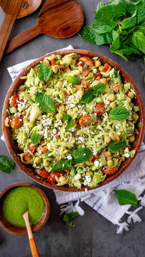 Introducing our sensational Mediterranean Pasta Salad! Bursting with flavors, it combines orzo pasta, cherry tomatoes, artichokes, and more, tossed in homemade lemon mint pesto. Perfect for any occasion! Pasta Cherry Tomatoes, Pesto Orzo, Mediterranean Pasta Salad, Mint Pesto, Pesto Dressing, Mediterranean Pasta, Orzo Pasta Salad, Fresh Recipes, Orzo Pasta