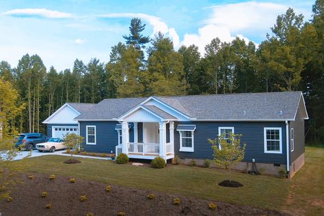 Clayton Unveils Ten New CrossMod™ Floor Plans for Home Buyers Modular Home With Garage, Blue Mobile Home Exterior, Double Wide Front Porch, Clayton Homes Modular Farmhouse, Modular Home Porch Ideas, Clayton Homes Modular, Modular Makeover, Manufactured Home Porch Ideas, Modular Home Exterior