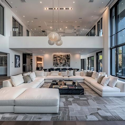 Luxurious Living Room in Jake Paul's Calabasas Mansion Regular Living Room, Modern Mansion Living Room, High Ceiling Windows, Luxury Sitting Room, White Sectional Sofa, Mansion Living Room, Family Lounge, Spacious Sofa, Large Sectional Sofa