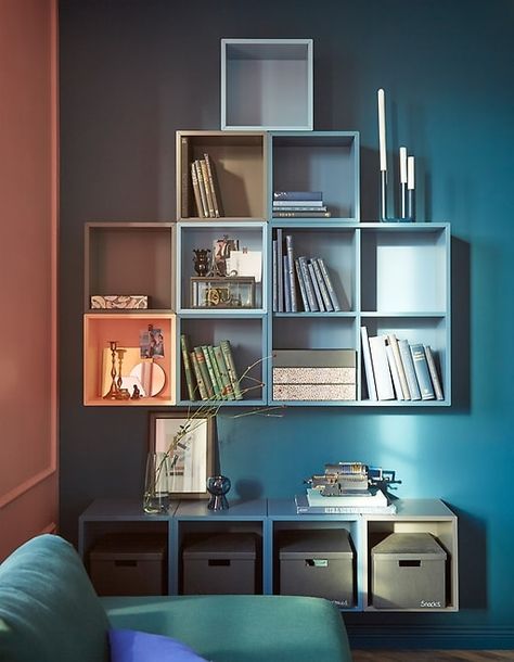 For living room furniture with impact, cover a wall in EKET cabinets from IKEA. Attach them together and in rows to make a unified square. Different shades of blue and grey create a custom style and accent your books, mementoes and other treasures. Bathroom Gray Cabinets, Ikea Record Storage, Wall Cabinets Living Room, Ikea Wall Cabinets, Bathroom Gray, Ikea Eket, Ikea Wall, Gray Cabinets, Open Cabinets