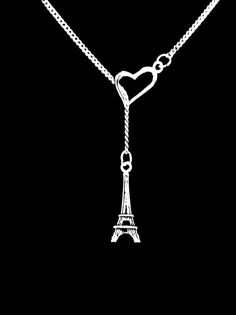 What a stunning necklace!  Silver color charms on 18" chain with lobster clasp.  "Y" style.  The Eiffel Tower charm is approx 1", pewter. Heart approx 1/2".  Very unique! We can adjust the length of chain if you prefer a different length. Chain made of silver plated alloy.         Brand new and includes gift packaging! Shipping -Items packaged for safe transport -Tracking number provided when item is shipped -Free Domestic Shipping (Priority Mail upgrade is available for domestic shipping for an additional charge) -International Buyers:  We charge only for item and shipping. Buyer is responsible for any VAT/ Import Duties that may be due upon delivery. Those fees don't come from us. Refunds/ Returns -30 day return policy -Items not intended for children under 14 Jewelry Care - Keep jewelry