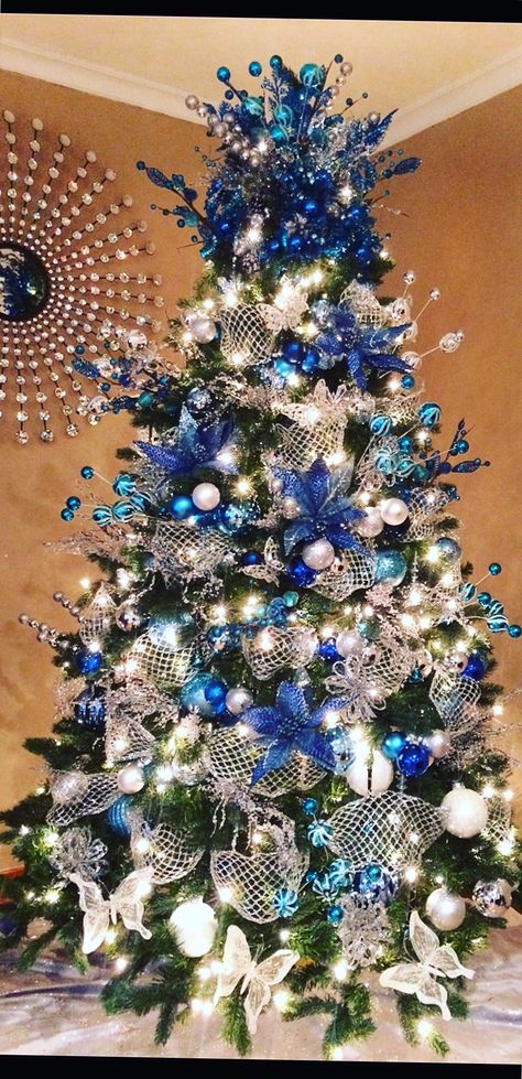 Blue and silver Christmas tree Blue And Silver Christmas Tree, Blue And Silver Christmas, Silver Christmas Tree Decorations, Blue Christmas Tree Decorations, Blue Christmas Decor, Silver Christmas Decorations, Blue Christmas Tree, Silver Christmas Tree, Christmas Tree Inspiration