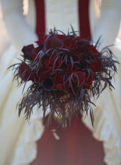 Black lily, red rose and black feather bouquet Pretty Wedding Bouquet, Pirate Wedding, Wedding Flower Guide, Spring Wedding Bouquets, Red Bouquet Wedding, Summer Wedding Bouquets, Goth Wedding, Dark Wedding, Flower Guide