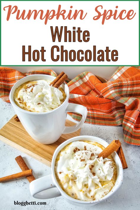 Indulge in cozy autumn vibes with this luxurious Pumpkin Spice White Hot Chocolate! A creamy blend of rich white chocolate and the warm flavors of pumpkin spice, this drink is perfect for crisp fall mornings or chilly evenings by the fire. Made with nutty almond milk, melted white chocolate, and pumpkin spices. Top it off with whipped cream, a sprinkle of pumpkin spice, it's a perfect drink to sip on and to share. Pumpkin Spice White Hot Chocolate, Autumn Hot Drinks, Pumpkin White Hot Chocolate, Hot White Chocolate, Cozy Fall Drinks, Pumpkin Hot Chocolate, White Hot Chocolate Recipe, Pumpkin Spices, Family Breakfast Recipes