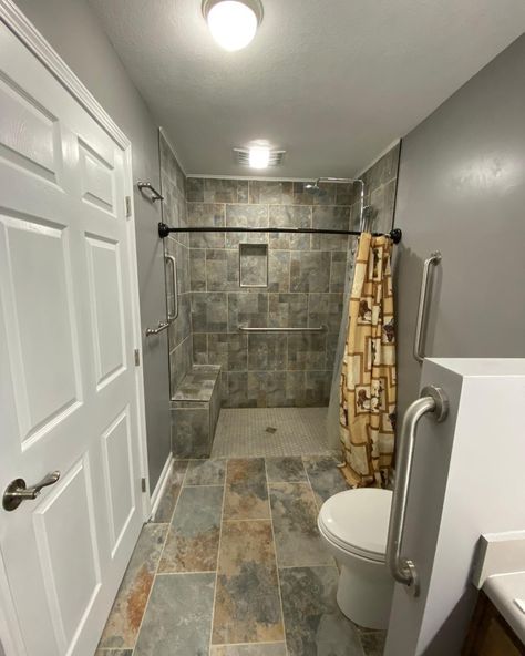 Roll-in showers, or barrier-free showers, are designed for people to roll directly into the shower using a shower wheelchair. The shower should be large enough for the wheelchair to maneuver within the stall. Wheelchair House, Wheelchair Accessible Shower, Single Wide Remodel, Shower Wheelchair, Roll In Showers, Garage Extension, Accessible House, Accessible Bathroom Design, Narrow Bathroom