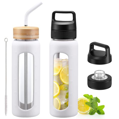 PRICES MAY VARY. 2 LIDS WATER BOTTLE - The inclusion of both a chug lid and a bamboo straw lid offers versatile drinking options for different preferences. You can easily switch between the lids depending on your needs. Whether for water, juice, smoothies, or other beverages, the glass water bottle with dual lids is ideal for various drink options. Chug lid provides easy access for quick hydration on the go, workouts, hikes or daily commutes. The bamboo straw lid offers a stylish way to sip drin Cool Water Bottles, Bottle Chug, Light Yellow Water Bottle, Drinking Glasses With Bamboo Lids, Lemon Water Bottle, Cups With Bamboo Lids, Glass Water Bottle Bamboo Lid, Clear Water Bottle, Turmeric Water